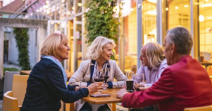 Happy Senior Couples Taking Outdoor Selfie at Ljubljana Cafe