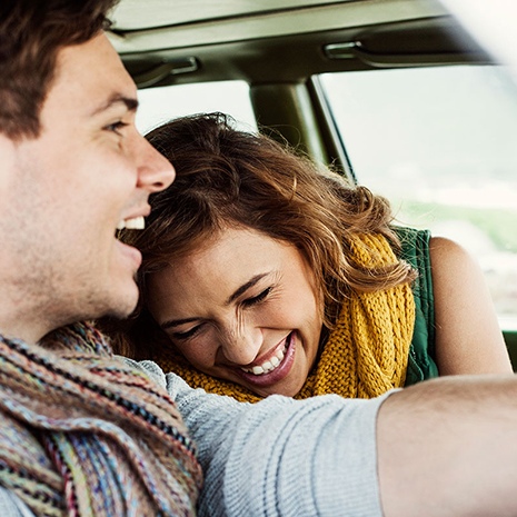 hearing-savers-unitron-discover-next-laughing-couple