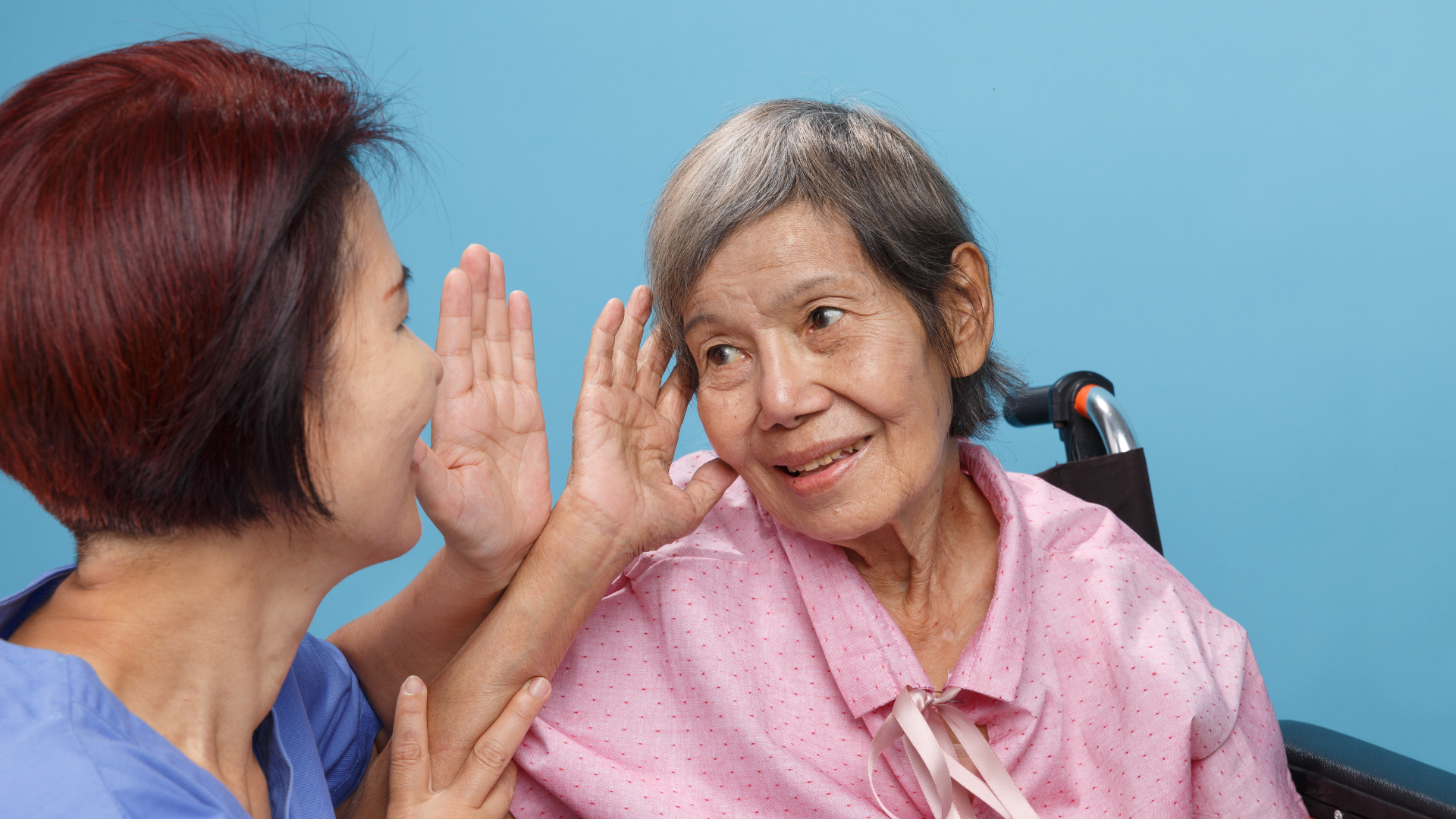 Old woman can't hear audiologist properly