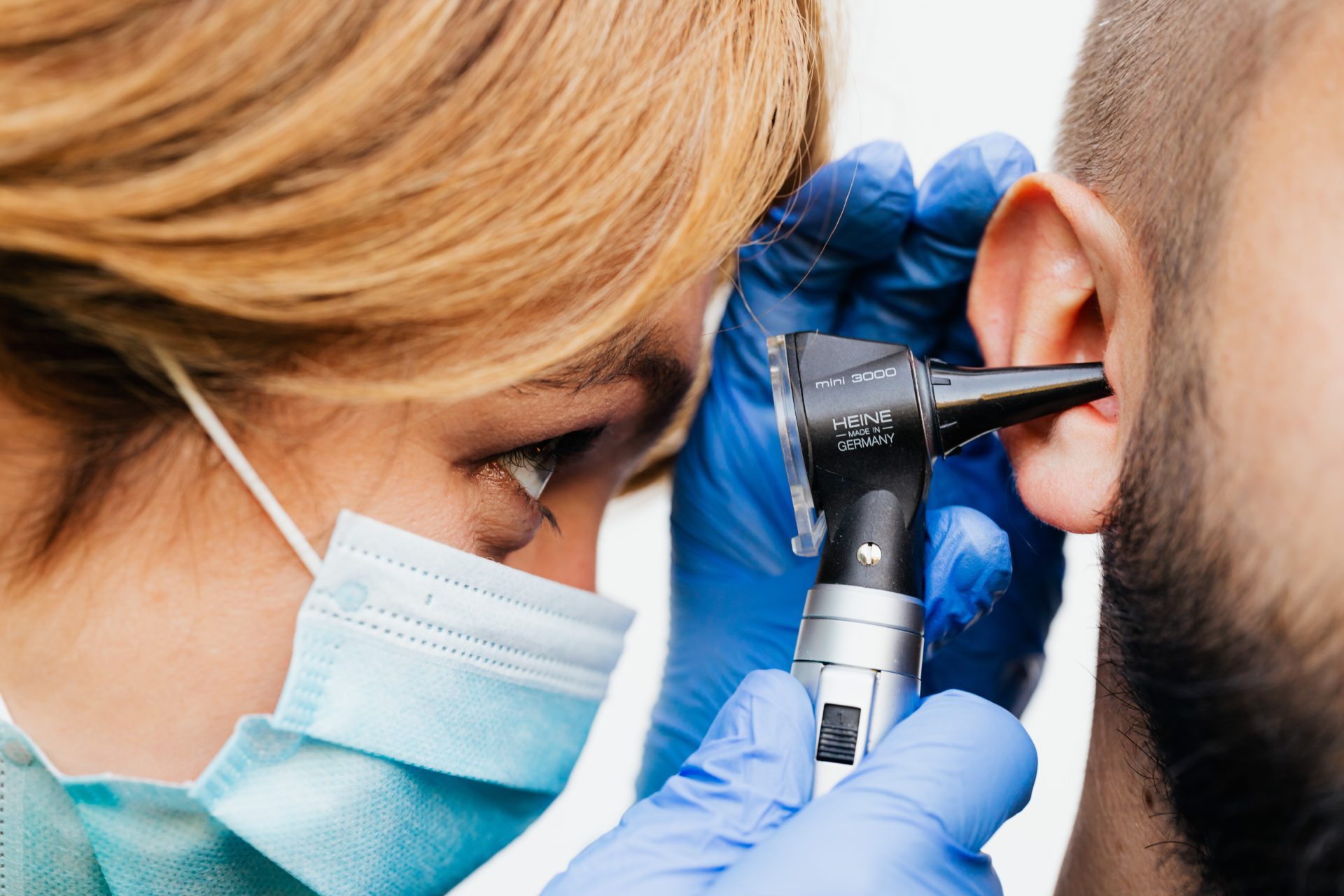 women doing ear assessment 