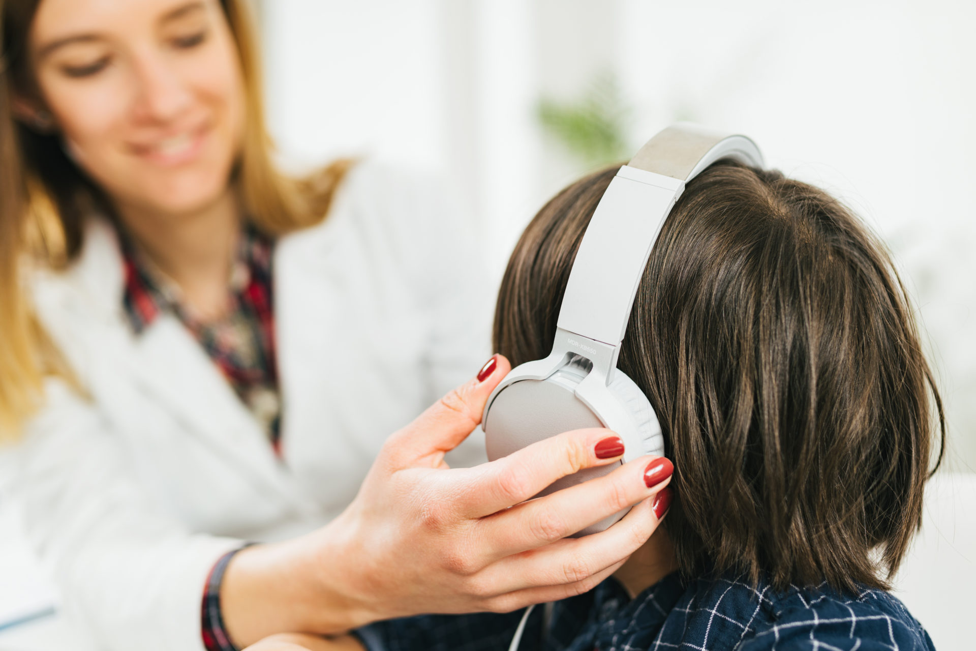 Hearing Test for Children - Boy Wearing Headphones, Having a Hearing Test